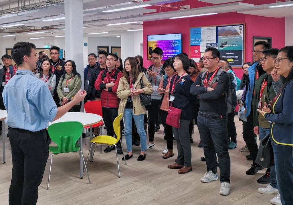 Me conducing a tour of the LDE UTC campus to a group of teachers from Hong Kong