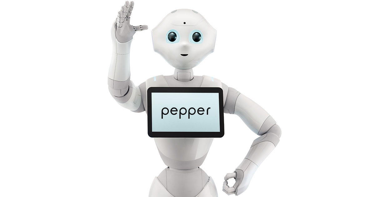 A white Softbank Robot, Pepper, waving at the camera